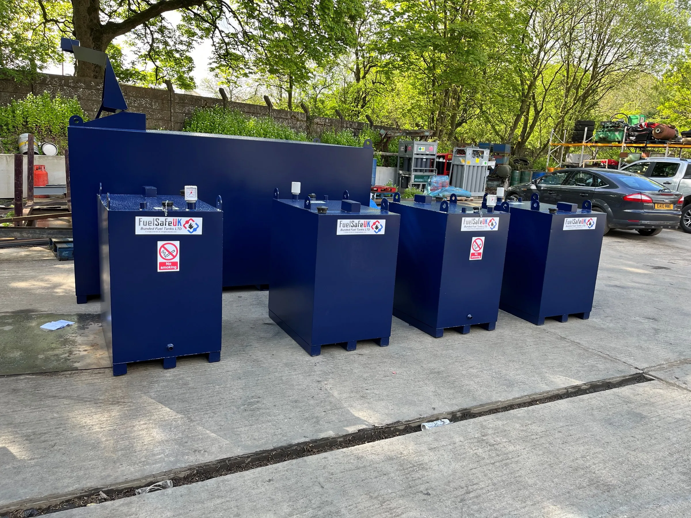 Blue 500 litre bunded fuel tanks ready for delivery